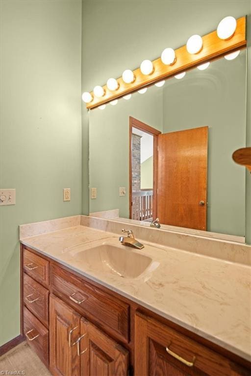 bathroom with vanity and tile patterned flooring