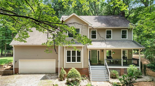 4008 Windspray Loop, Summerfield, NC 27358 - view of front of property with covered porch, gravel driveway, a chimney, an attached garage, and roof with shingles