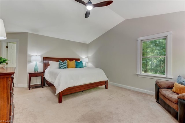 4008 Windspray Loop, Summerfield, NC 27358 - bedroom featuring lofted ceiling, light colored carpet, and a ceiling fan