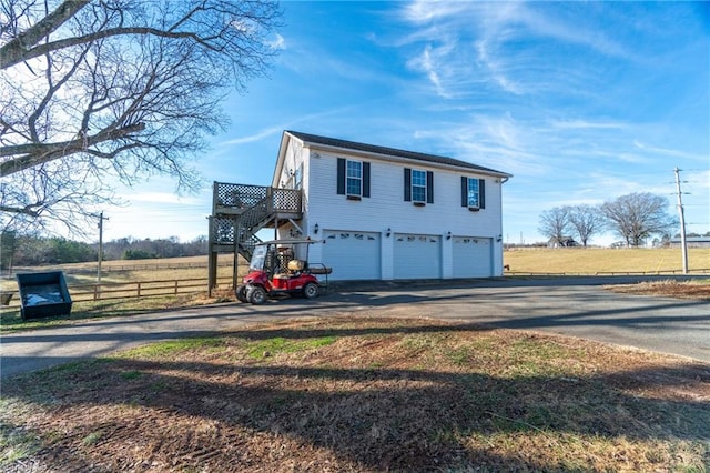 view of home's exterior with a garage