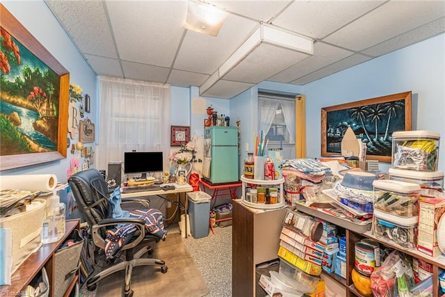 office area featuring a paneled ceiling