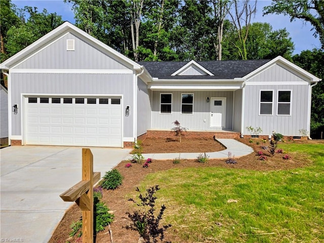 317 Styers Rd, Winston-Salem, NC 27105 - single story home featuring a shingled roof, an attached garage, a porch, crawl space, and concrete driveway