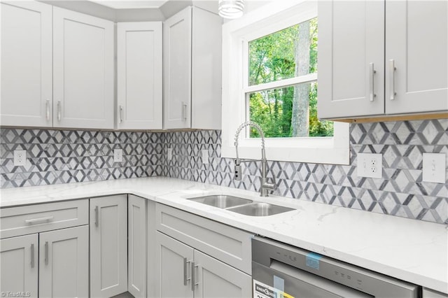 317 Styers Rd, Winston-Salem, NC 27105 - kitchen featuring a sink, light stone counters, backsplash, and dishwasher