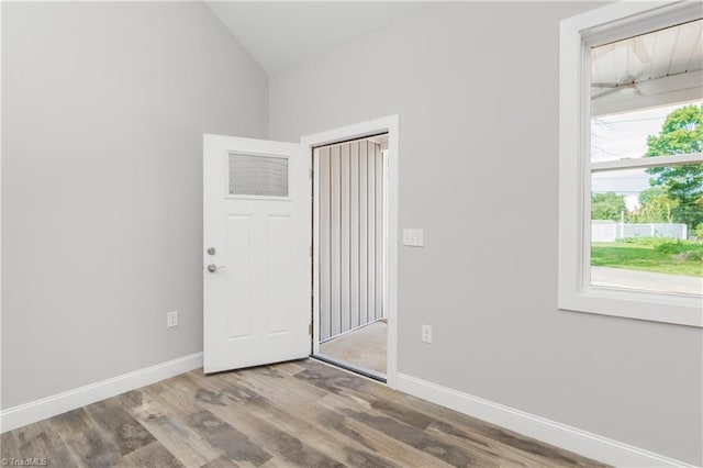 317 Styers Rd, Winston-Salem, NC 27105 - unfurnished room featuring baseboards, wood finished floors, and lofted ceiling