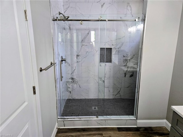 317 Styers Rd, Winston-Salem, NC 27105 - bathroom with a marble finish shower, wood finished floors, and vanity