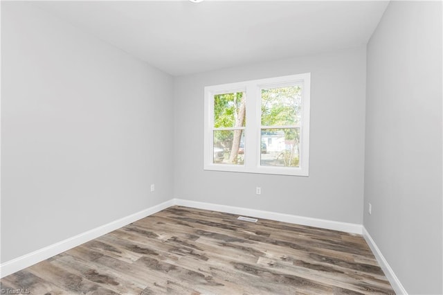 317 Styers Rd, Winston-Salem, NC 27105 - empty room featuring baseboards, wood finished floors, and visible vents