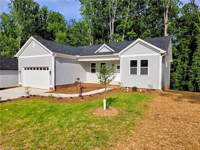 317 Styers Rd, Winston-Salem, NC 27105 - single story home with concrete driveway, crawl space, a front lawn, and a garage