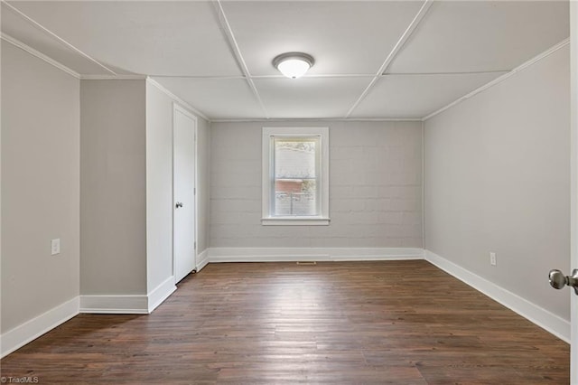 unfurnished room featuring dark hardwood / wood-style flooring