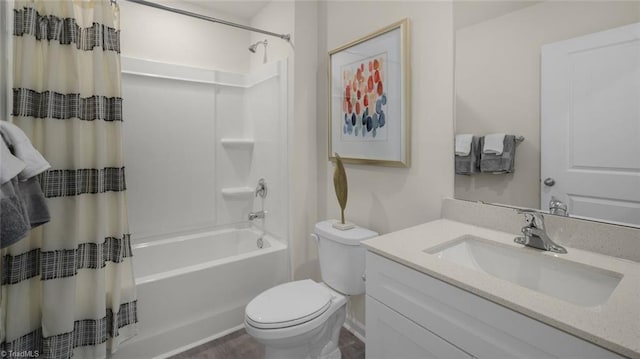 bathroom featuring shower / bath combo with shower curtain, vanity, and toilet