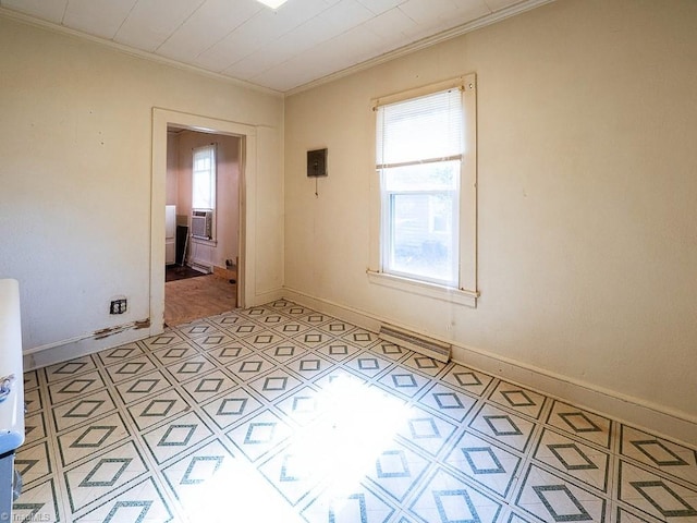 unfurnished room featuring ornamental molding