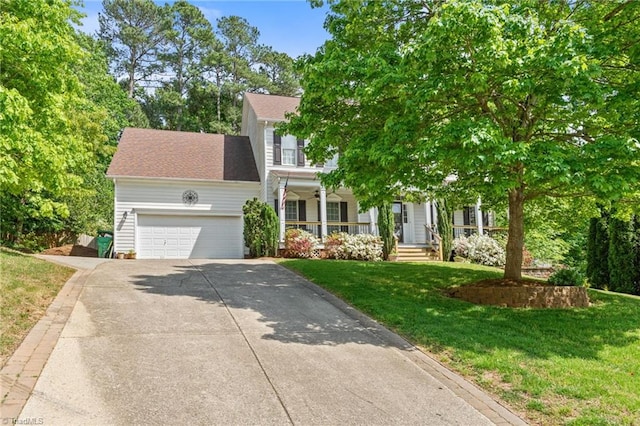 view of front of house featuring a garage, a porch, driveway, a front yard, and roof with shingles