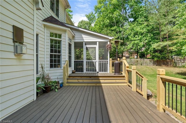 wooden terrace with a sunroom