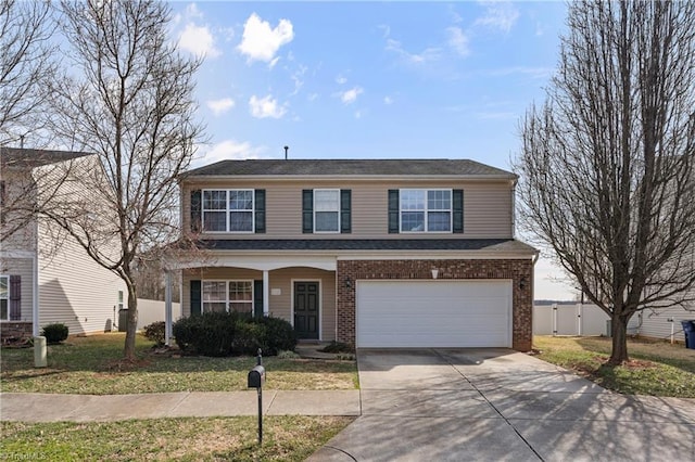 traditional home with a front lawn, concrete driveway, brick siding, and an attached garage