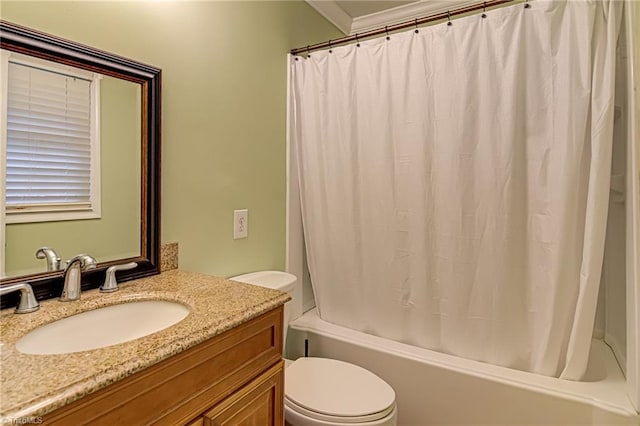 full bathroom featuring vanity, toilet, and shower / bath combination with curtain