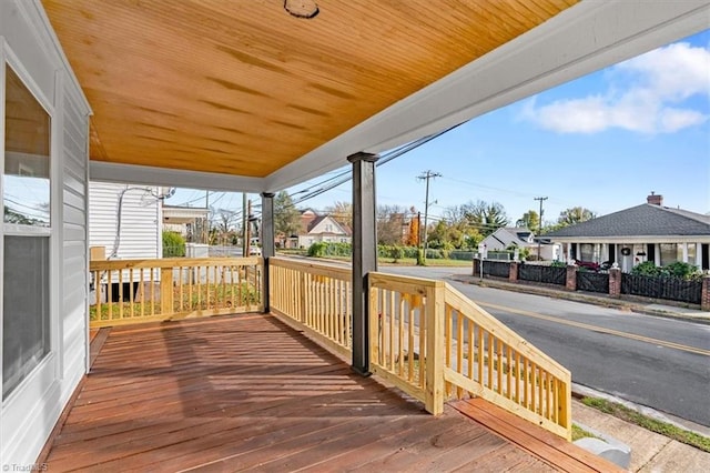 wooden terrace featuring a porch