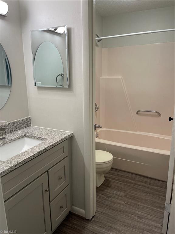 159 Turnwood Ln, Winston-Salem, NC 27104 - full bathroom with vanity, shower / tub combination, and wood finished floors