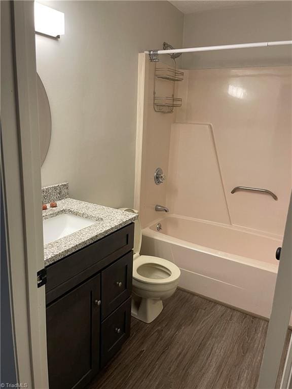 159 Turnwood Ln, Winston-Salem, NC 27104 - bathroom with wood finished floors, vanity, and tub / shower combination