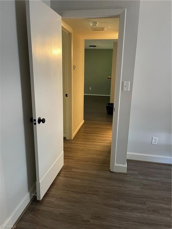 159 Turnwood Ln, Winston-Salem, NC 27104 - hallway with baseboards and dark wood-type flooring