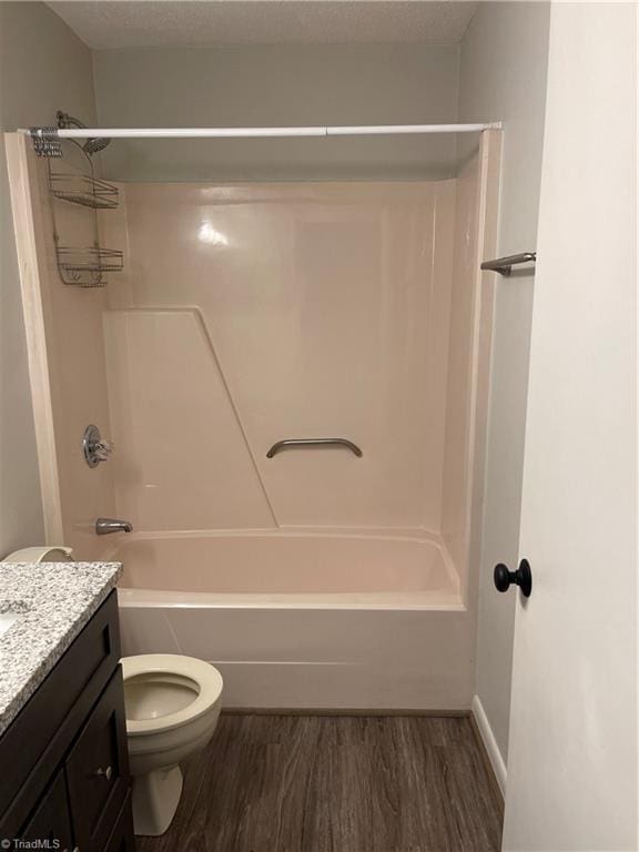 159 Turnwood Ln, Winston-Salem, NC 27104 - bathroom with wood finished floors, vanity, and tub / shower combination