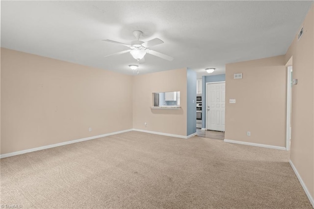 1040 Rock Knoll Ct Unit 193, Winston-Salem, NC 27107 - unfurnished room with light carpet, ceiling fan, and baseboards