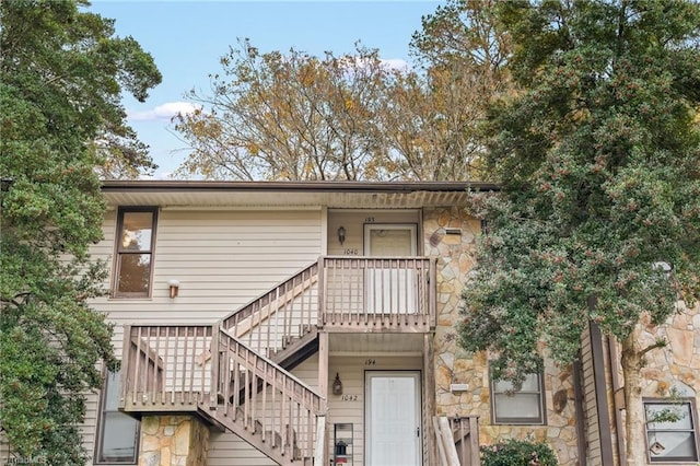 1040 Rock Knoll Ct Unit 193, Winston-Salem, NC 27107 - view of front of home featuring stone siding and stairway