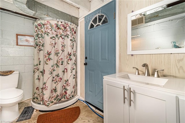 bathroom with vanity, toilet, and a shower with curtain