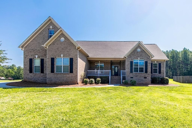 6402 Calvary Way, Thomasville, NC 27360 - view of front facade featuring a porch, brick siding, and a front lawn