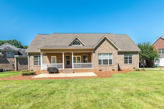 6402 Calvary Way, Thomasville, NC 27360 - rear view of house with crawl space, brick siding, and a yard