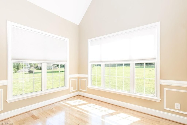 6402 Calvary Way, Thomasville, NC 27360 - empty room with vaulted ceiling and wood finished floors