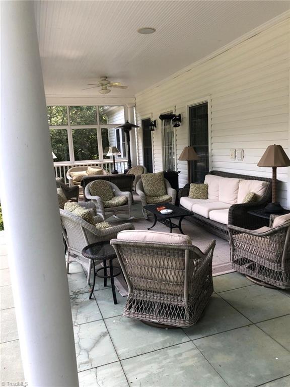 view of patio / terrace featuring ceiling fan and an outdoor living space