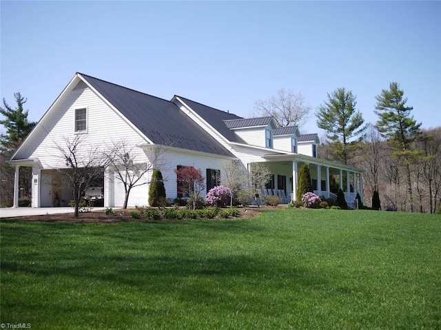 exterior space featuring a yard and a garage