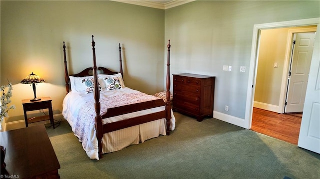 carpeted bedroom featuring ornamental molding