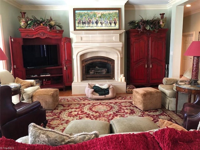 living room with crown molding and hardwood / wood-style floors