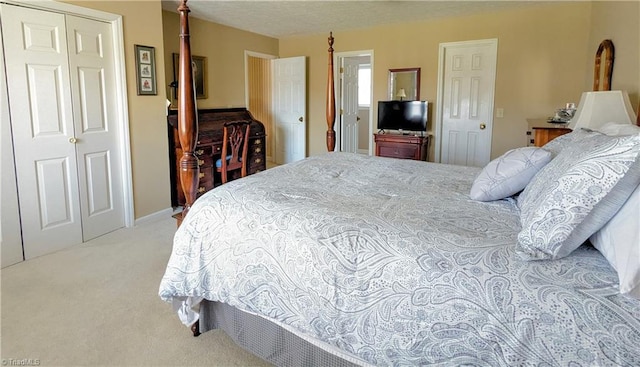 bedroom featuring light carpet