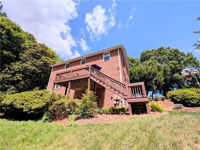 rear view of property with a deck