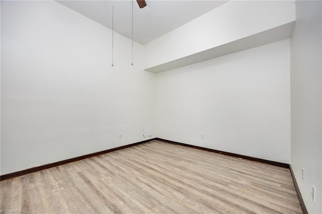 unfurnished room featuring light hardwood / wood-style flooring and ceiling fan