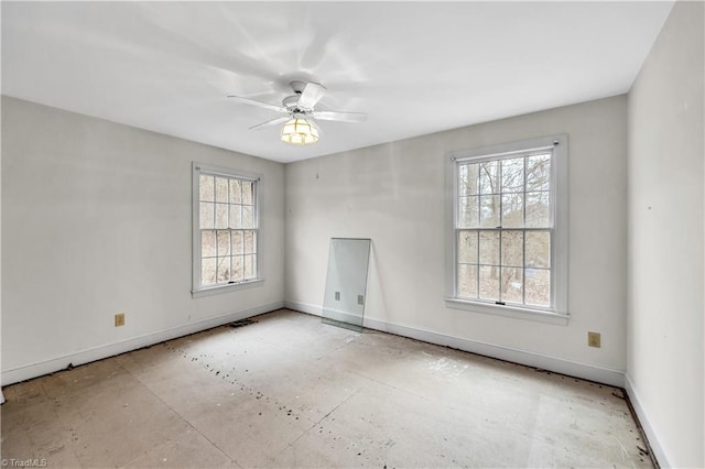 spare room featuring ceiling fan