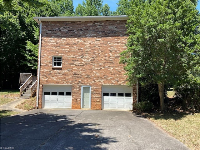 view of property exterior with a garage