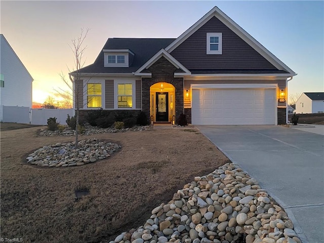 craftsman house with a garage