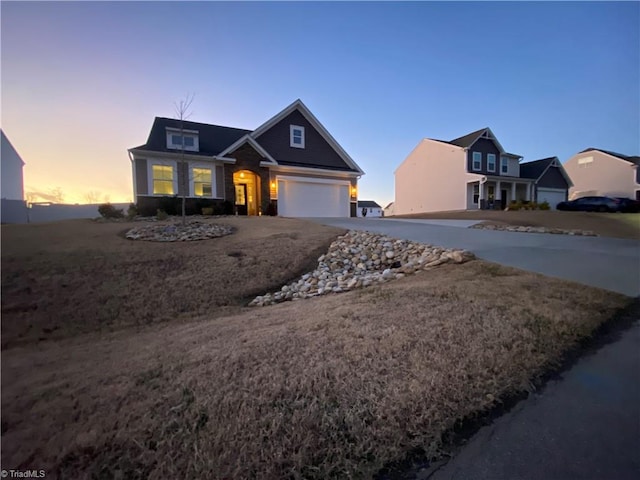 view of front of property with a garage