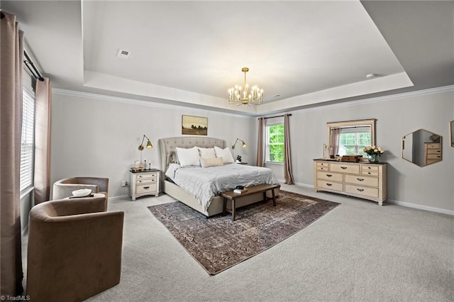 carpeted bedroom featuring an inviting chandelier, a raised ceiling, and baseboards