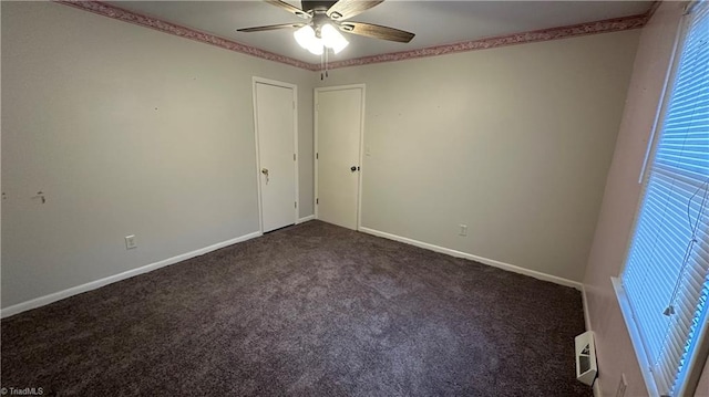 carpeted empty room with ceiling fan