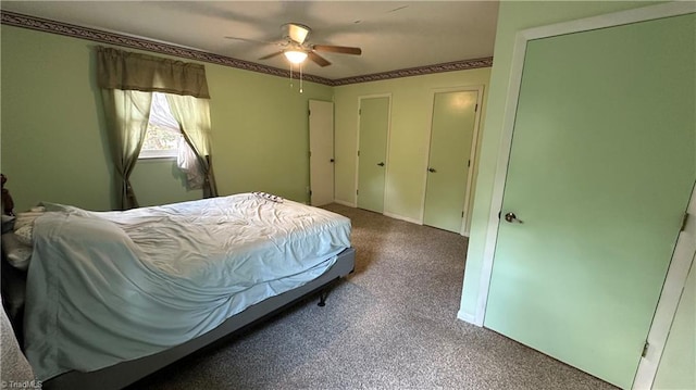 bedroom featuring ceiling fan and carpet flooring