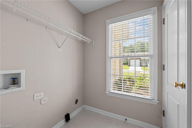 laundry room with washer hookup, laundry area, a healthy amount of sunlight, and baseboards