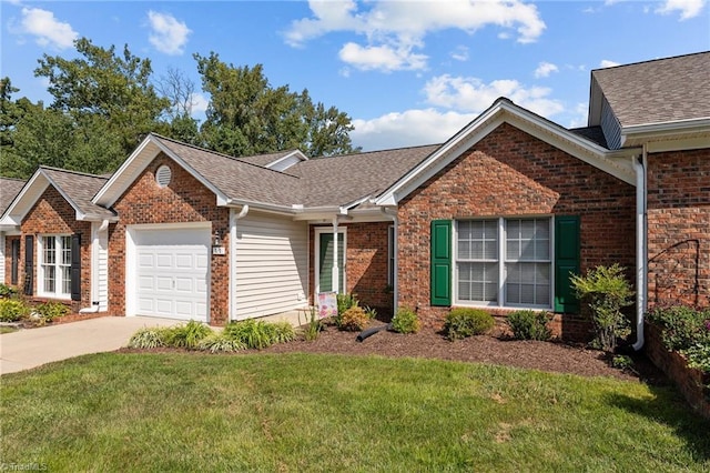 ranch-style home with an attached garage, a front lawn, concrete driveway, and brick siding