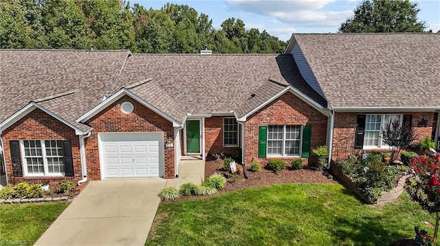 single story home with a garage, brick siding, concrete driveway, roof with shingles, and a front yard