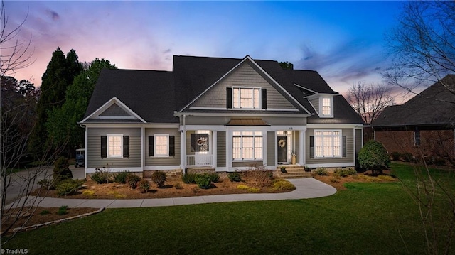 view of front of home featuring a yard