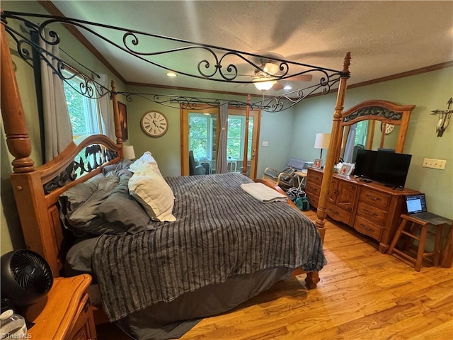 1346 Overland Trl, Hays, NC 28635 - bedroom with crown molding, light wood finished floors, access to exterior, and a textured ceiling