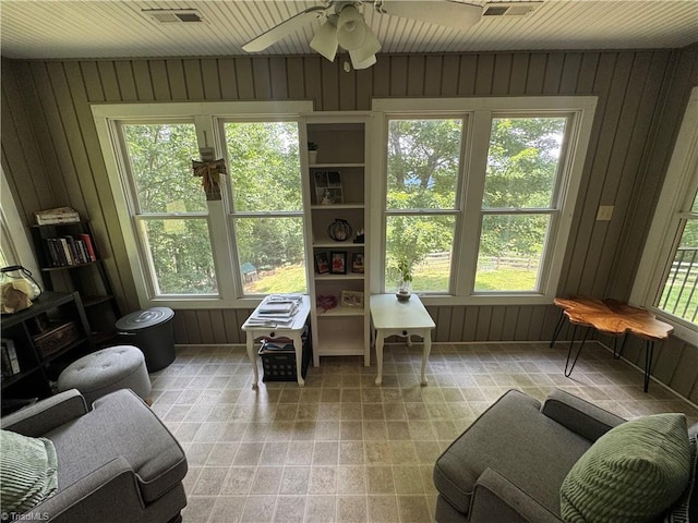 1346 Overland Trl, Hays, NC 28635 - living area with wooden walls and ceiling fan
