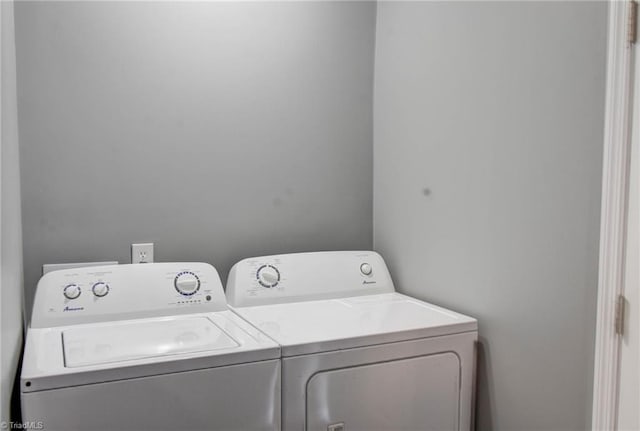 laundry room with laundry area and separate washer and dryer